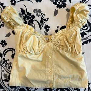 WITH JÉAN yellow button up top